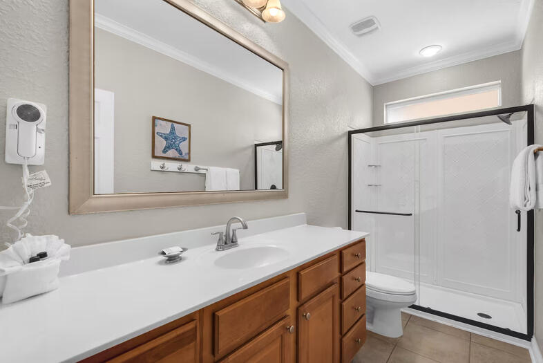 Destin Florida Vacation Rental Second Floor Renovated Bathroom second floor bathroom with single sink and shower